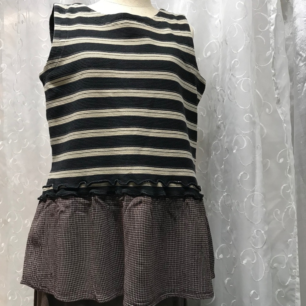 Upcycled tunic in brown, black, and creme.